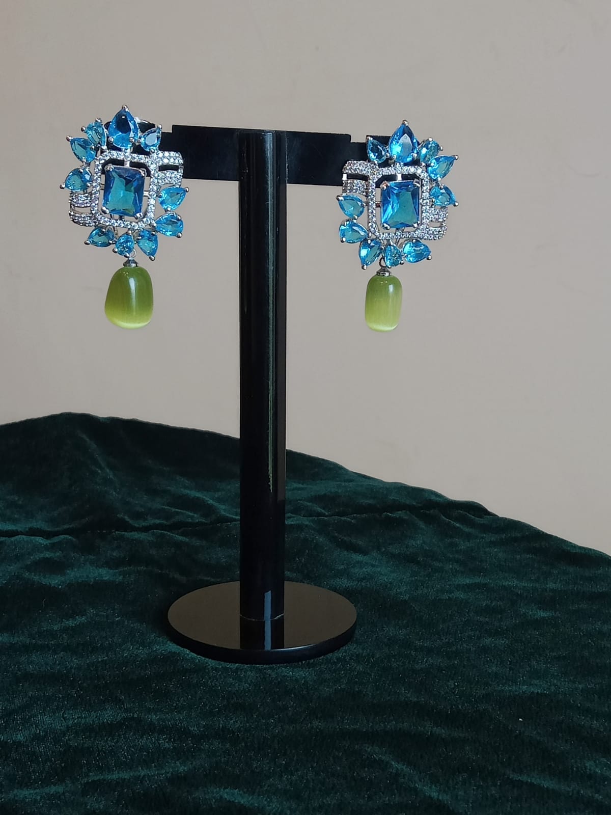 Light blue earrings.